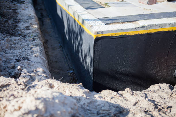 Professional Emergency Waterproofing technician working in Hesston, KS
